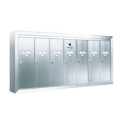 Seven vertical door silver anodized aluminum mailbox with name and number id card holders.
