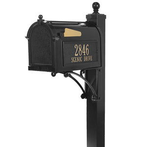 Whitehall black cast aluminum mailbox with custom address plaque on the side in gold letters and gold flag