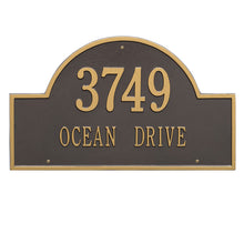 Load image into Gallery viewer, Whitehall Arch Marker two line estate wall mount plaque. The plaque has an arched shape and has gold lettering and a brown background.
