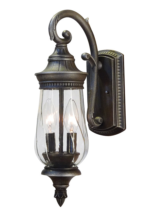 Caldwell top mount outdoor light with an ornate backplate and post and clear glass lantern type globe