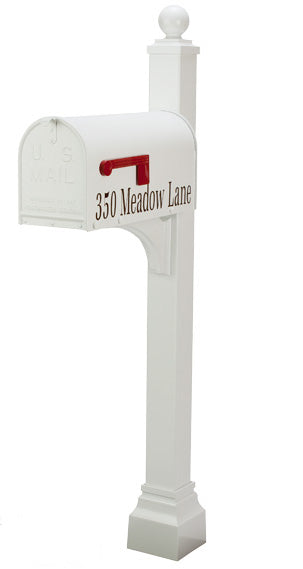 White Janzer mailbox and post with ball finial and decorative square cuff base. The address is added to the mailbox on the flag side