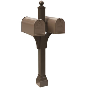 Bronze Janzer double Mailbox with decorative ball finial and decorative, square cuff at the base. Two bronze mailboxes are mounted on either side. 