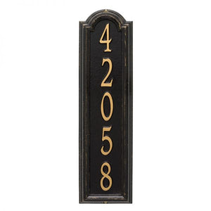 Whitehall Manchester vertical plaque. This plaque is rectangular is design with a small arch on top. This plaque has gold numbers and a black  background