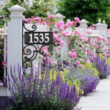 Load image into Gallery viewer, Nite Bright reflective ornate post with rectangle address plaque and reflective address numbers mounted on front entryway post
