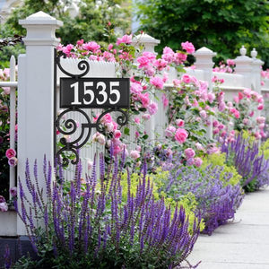 Nite Bright reflective ornate post with rectangle address plaque and reflective address numbers mounted on front entryway post