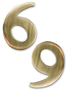 two inch brass number 6 or 9, self adhering made by 3m