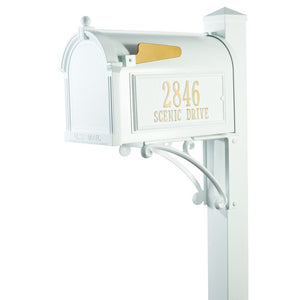 Whitehall white cast aluminum mailbox with custom address plaque on the side in gold letters and gold flag